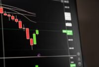 Ilustrasi kalender dengan penanda tanggal-tanggal penting, menunjukkan jadwal pembagian dividen dari berbagai perusahaan di pasar modal yang dinantikan oleh para investor.